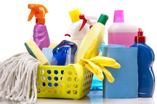 Cleaner preparing a Ruislip property for move in with dusting and floor care
