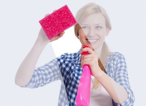 Professional carpet cleaning equipment in use on a carpeted floor